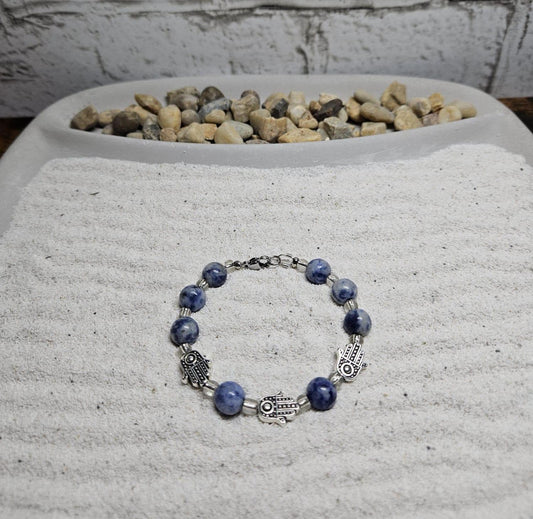 Handcrafted Blue Sodalite and Hamsa Charm Bracelet | Tranquility and Protection Jewelry